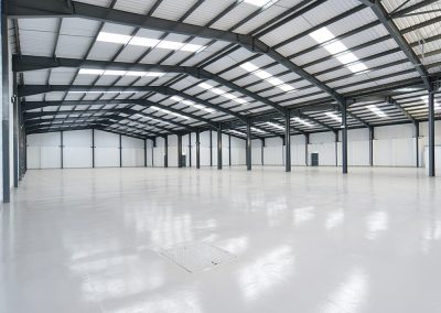 Commercial steel warehouse with roll-up doors