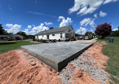 Finished concrete patio behind a North Carolina home