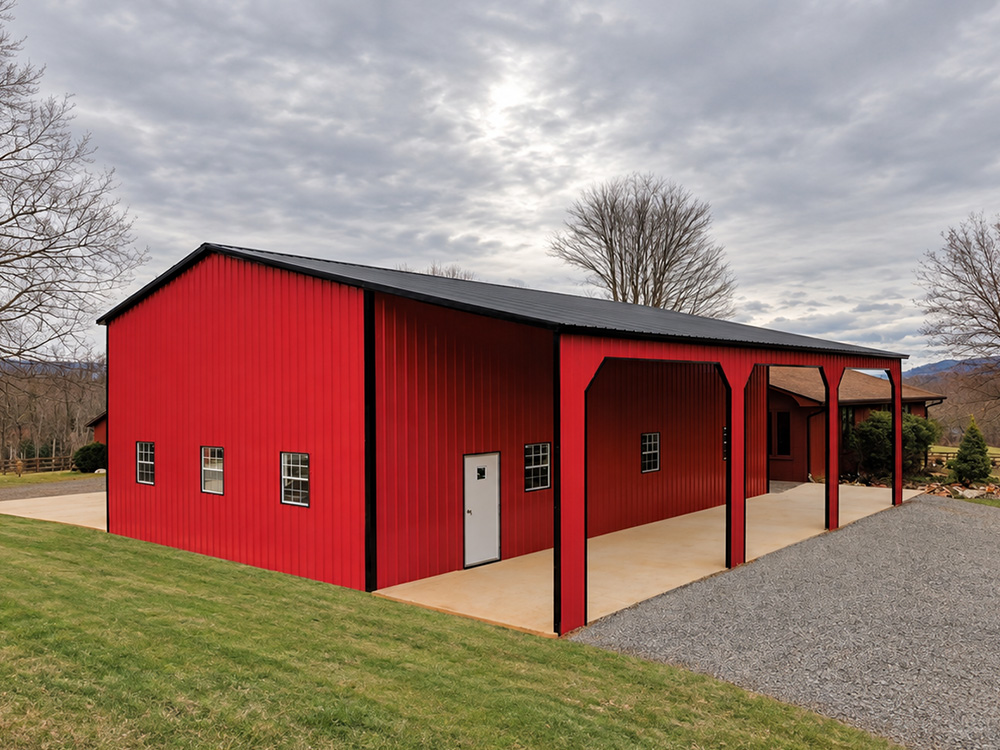 Steel building in NC with red siding, black trim & roof with overhang and garage doors